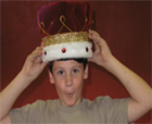 image of boy with wearing a crown